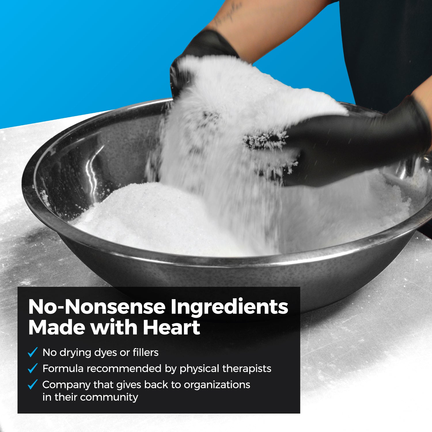 A Muscle Rehab artisan wearing gloves and hand-blending Muscle Rehab's Bath Soak for Athletes in a large stainless steel bowl.